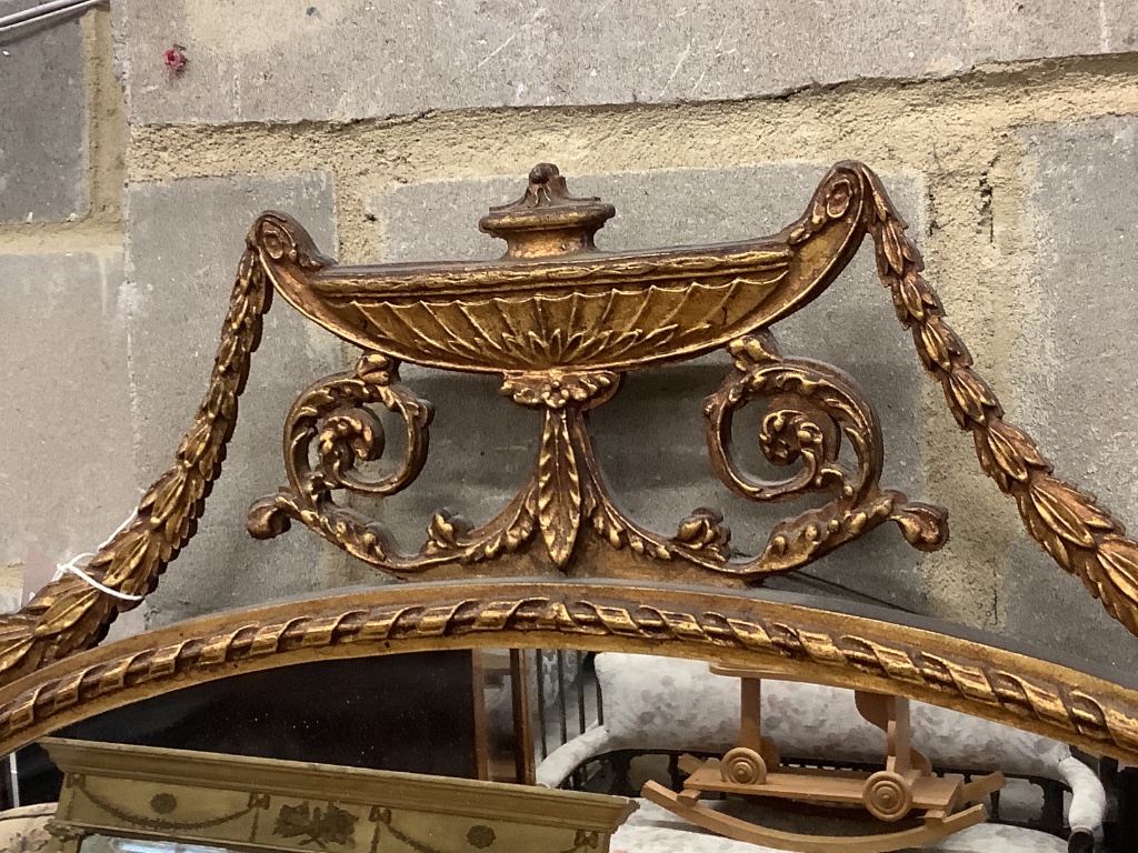 An oval gilt framed Adam design wall mirror, width 80cm height 70cm